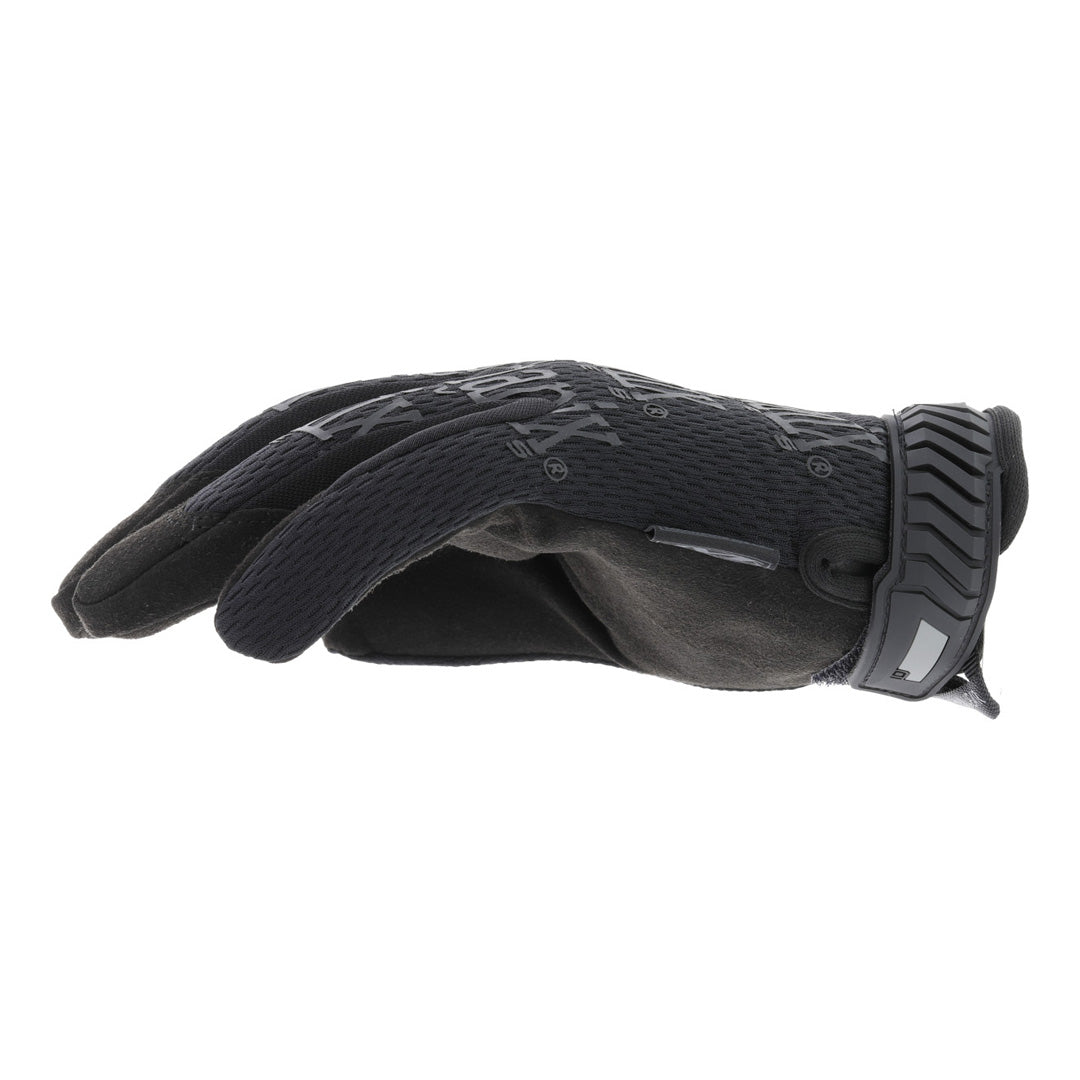 Detailed side view of black Mechanix Wear The Original Covert Tactical Gloves, highlighting the secure hook and loop wrist closure and nylon storage loop.