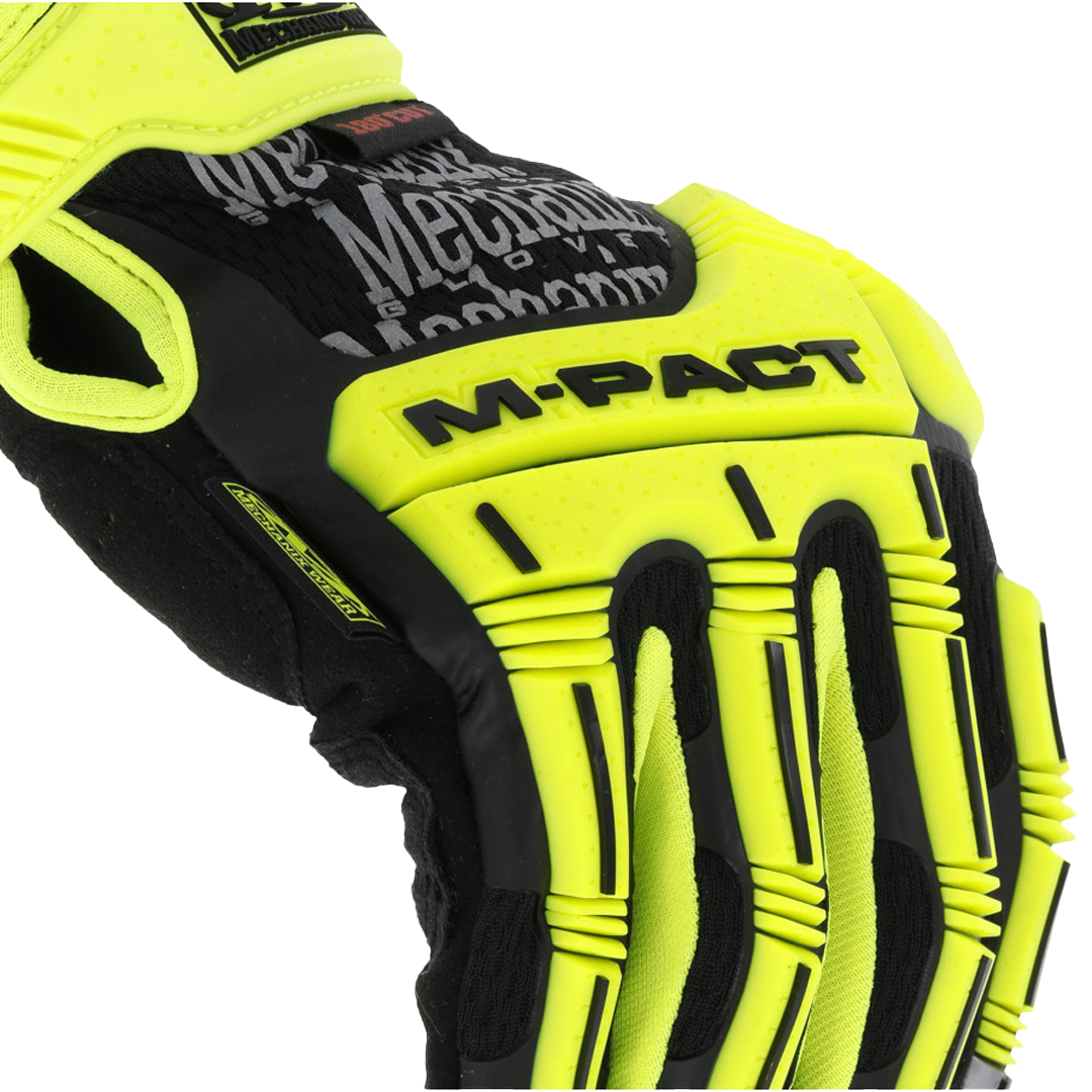 close-up of yellow m-pact tpr protection on mechanix wear glove backhand with visible branding