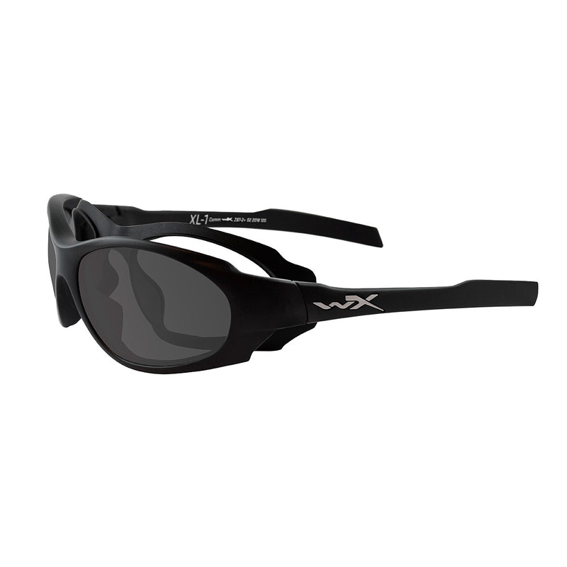angled side view of wiley x xl-1 advanced comm 2.5 matte black frame with clear ballistic-rated lenses