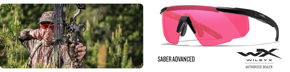 Man wearing Saber Advanced Wiley X vermillion lenses while bow hunting in low light environment.